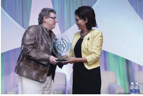 Koni receiving the NAWBO Hall of Fame Award